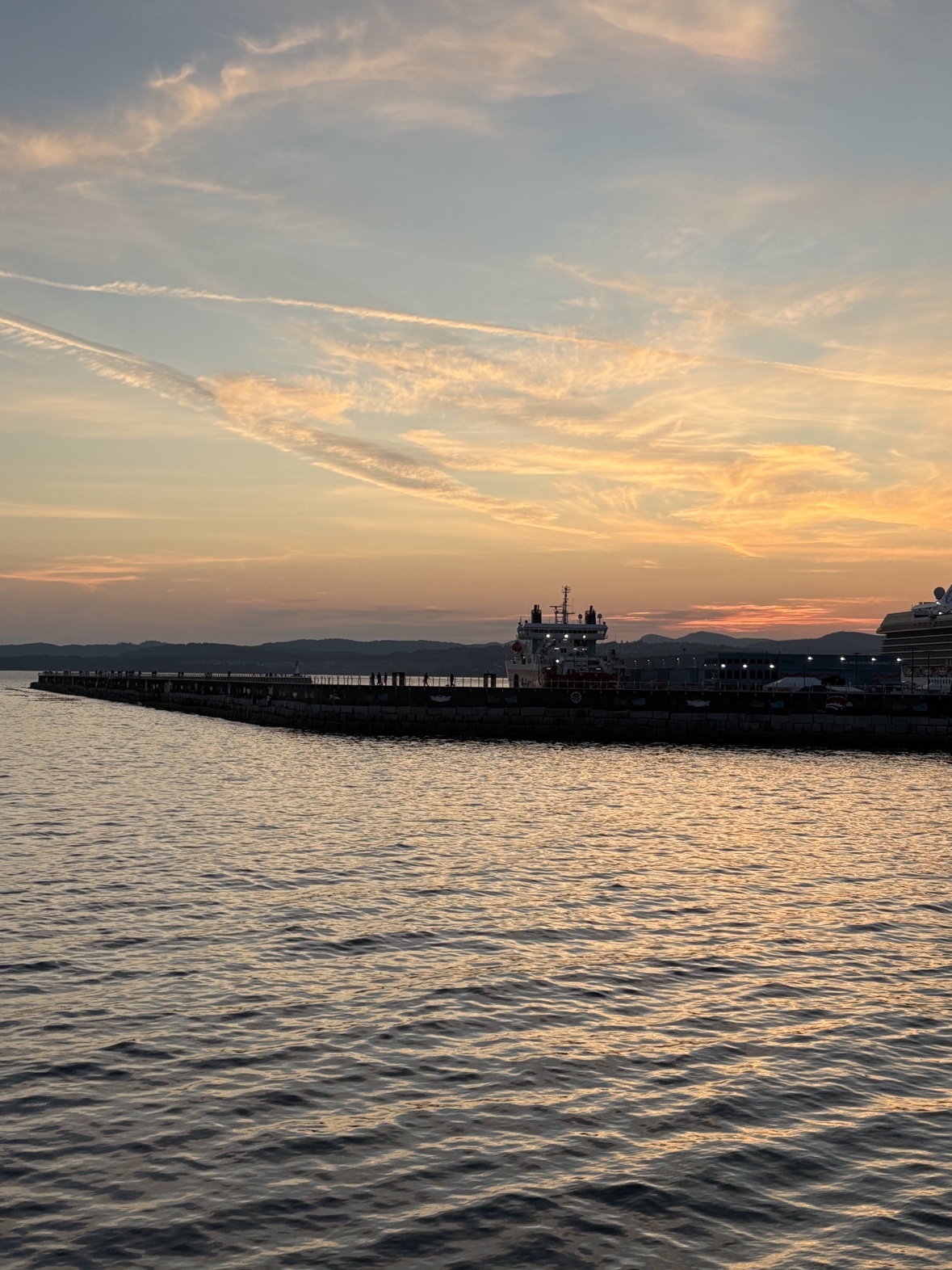 Sunset over the breakwater pier in Victoria, BC